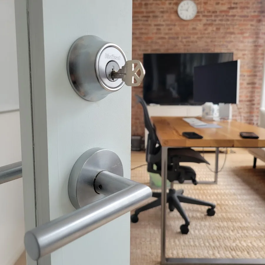 Residential lock and entry hardware during locksmith inspection